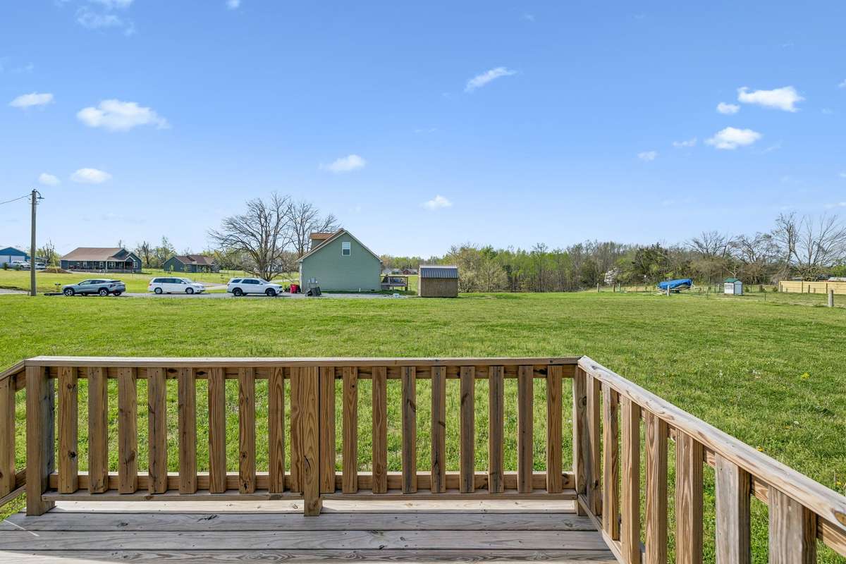 Open acreage providing privacy, space, and a peaceful country setting.