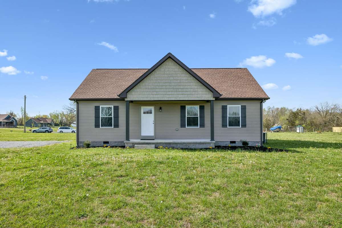 Charming like-new home situated on a beautiful 1.01-acre corner lot with inviting curb appeal and plenty of outdoor space.