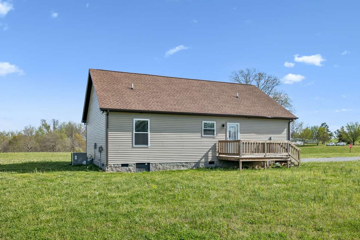 Expansive backyard with plenty of room to play, garden, or enjoy the outdoors.