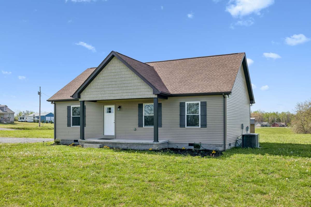 Charming like-new home situated on a beautiful 1.01-acre corner lot with inviting curb appeal and plenty of outdoor space.