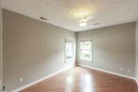 This additional bedroom also features durable flooring and could serve as a home office, workout space, or hobby room.