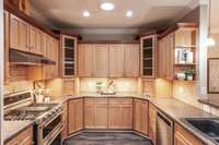 Generous cabinetry provides excellent storage for cookware, pantry items, and small appliances.