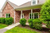 Enjoy the outdoors in comfort on the rear covered patio, perfect for relaxing or entertaining.