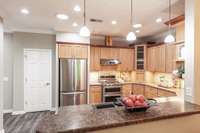 New flooring and fresh paint in 2023–2024 give the kitchen a clean, updated feel throughout.