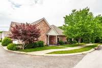 All-brick, flat-style condo with zero-entry access and no steps inside or out for effortless everyday living.