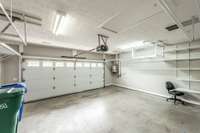 Generously sized garage provides secure parking with plenty of room for tools, bikes, or seasonal storage.
