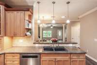A convenient flow from the kitchen into the spacious dining room, perfect for serving guests or casual family meals.