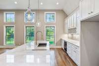 Beautiful warm glow flowing across the island and countertops