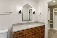 Bathroom in 4th bedroom with custom walk-in closet