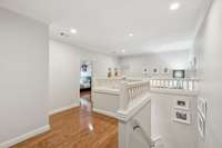 The second level loft area offers a smaller space here, perfect for a cozy reading nook - and.....