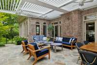 There are also several ceiling fans and lighting that are part of this thoughtfully designed pergola structure