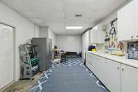 The workshop is accessible thought the garage and offers plenty of storage space, as well as access to a large closet that could serve as a storm shelter