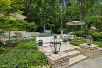 Every detail has been thoughtfully and tastefully incorporated here, from the elegant iron lanterns to the professional designed and perfectly maintained landscaping enhancements.