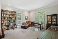 This main level bedroom is currently being used as an office