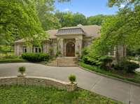 Gorgeous curb appeal!  This custom built residence is situated in desirable Heathrow Hills ~ a highly coveted Brentwood location.  The home is less than a mile to the center of town, walking distance to schools and parks and offers easy access I65.