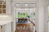 A look from the kitchen into the breakfast dining area