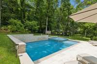 The spa at the far corner is a tranquil place to relax on a cooler evening.
