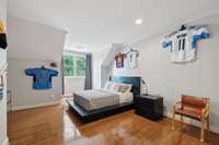 One of two spacious ensuite bedrooms upstairs ~ each feature charming alcoves that enhance the space.