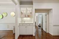 This butlers pantry area is adjacent to the formal dining room - entertaining is a breeze in this home!