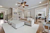 Large formal living room with fireplace.