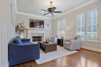 Cozy up to the fireplace in the sitting area off of the kitchen.