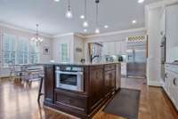 Drawer microwave for easy access, a gas stove, $9,100 GE Cafe fridge.