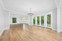 A lovely dining area overlooks the backyard.