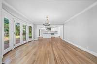 This kitchen to dining flow is perfect for family gatherings.