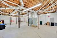 There is so much space for living, working, storing...there is also a full bath in the basement.