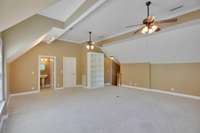 There is also a half bath, huge walk in closet with attic access and a built in shelf. This is the only room that has carpet.