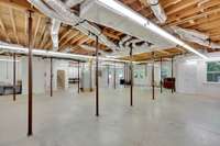 Check out the high ceilings. This will make renovations easier if you decide to finish out for additional 2700sqft.