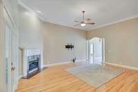 The living room has a gas fireplace and is adjacent to the kitchen.