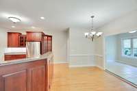 Another view of the kitchen from the living area. You have a glimpse of part of the kitchen cabinets.