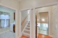 The bonus room steps are close by, too. The closed door on the far right of this image is an additional pantry.