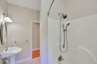 This area has the tub/toilet and also that additional sink that can be accessed directly from the hallway.