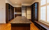 Huge walk in closet with windows, so you'll never confuse your navies and blacks!