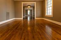 View from the living room to the dining room located on the other side of the front door. An entertainer's dream!