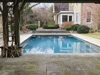 Pool view taken from under the pergola