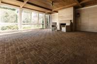 Screened porch has wood burning fireplace