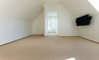 Bedroom 5 could also be a home gym or yoga room. It has a full attached  bath