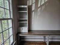 Shelves and cubbies at the desks