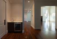 Wet bar in kitchen with wine refrigerator