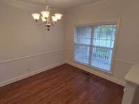 Multi-Use Room with Large Window. Great for Office or Dining Room