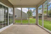 Enjoy your peaceful screened patio.