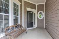 Front Porch-Attractive window casings. Upgraded front door with stain glass window :)
