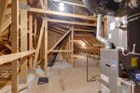 Walk in attic from bonus rm. The HVAC has an air purifying filter. The owner eliminated the inconvenience of having to change 2 air filter returns in the ceiling to one filter locate here in the walk-in attic.