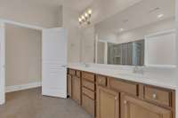 Master bath double vanities and tiles floors.