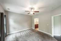 Primary bedroom suite with attached bath.