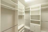 Walk in closet in the primary has a complete closet system.