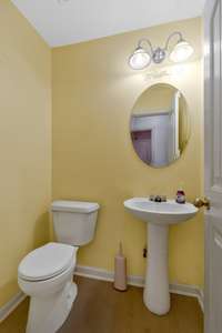 Half bath is located across from the laundry/mudroom right when you enter from the garage!